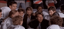 Use this 'Go Team!' GIF to motivate and show support. Ideal for team communication and boosting morale.