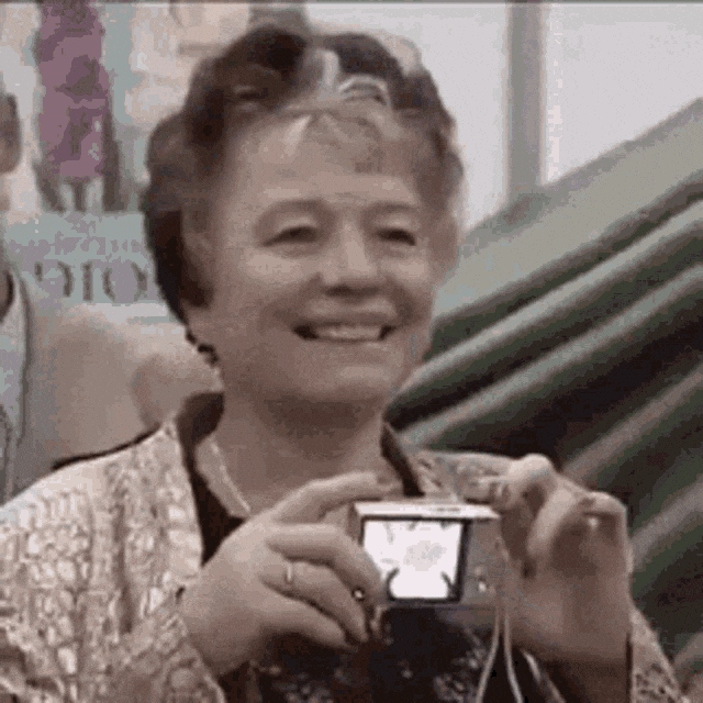 Use this smile GIF for minor technical glitches. A lighthearted reaction for less critical workplace issues.